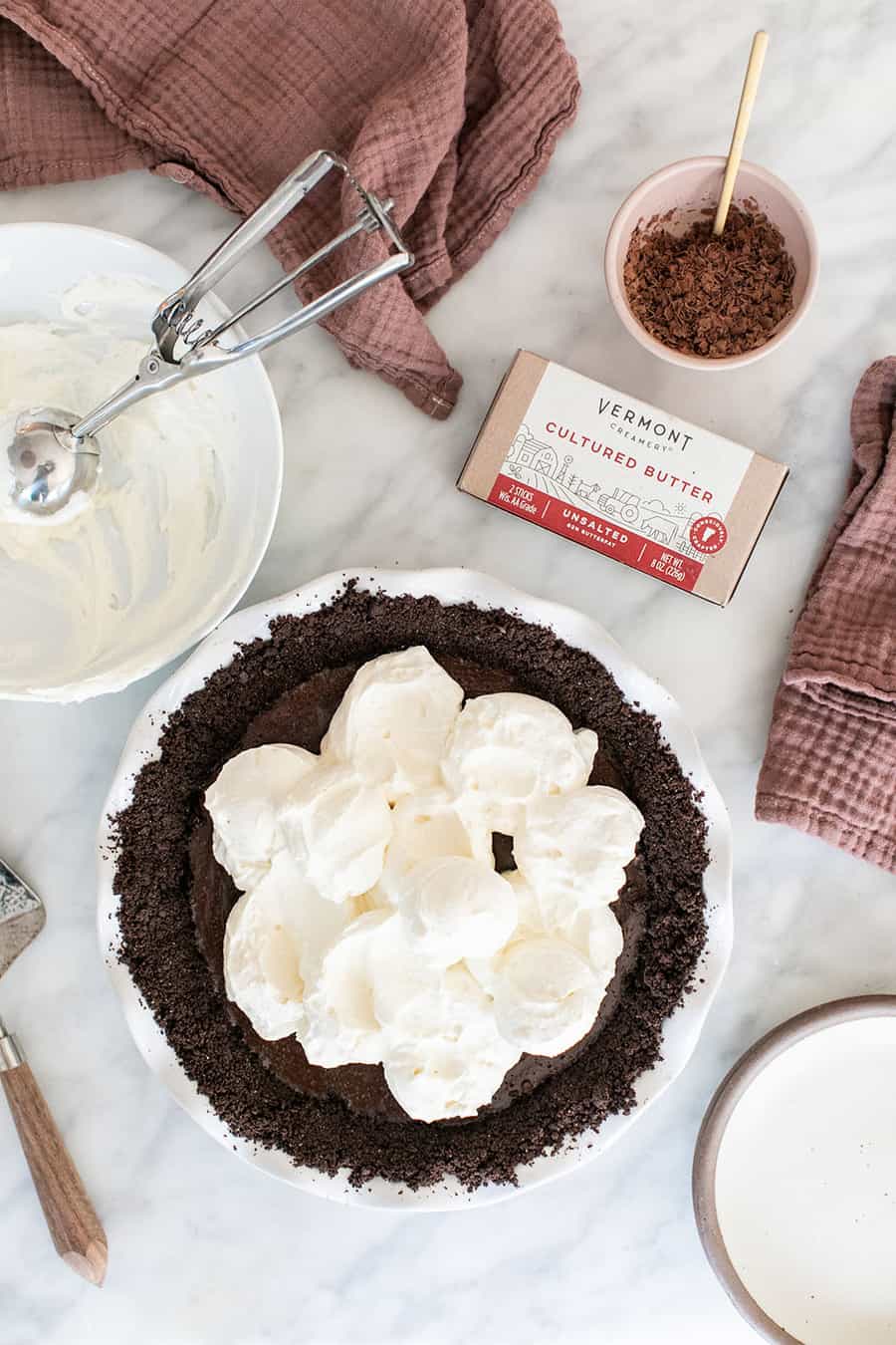 Chocolate pie with whipped cream and chocolate crumb crust