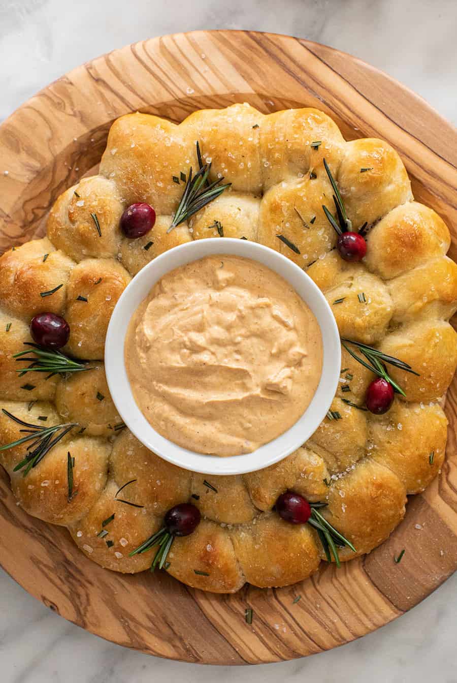 Christmas bread wreath with cheese dip.