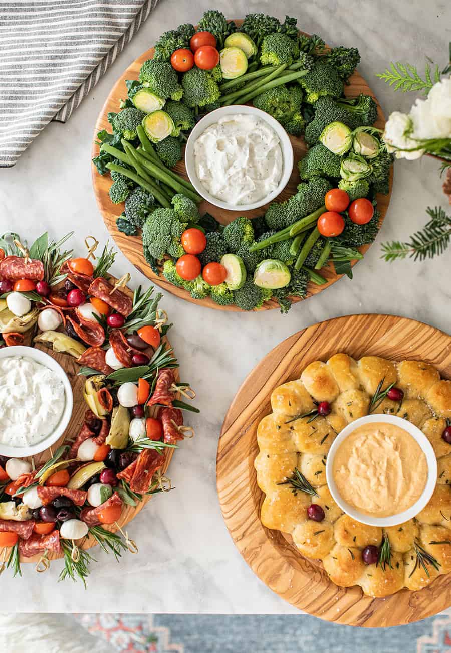 Easy Christmas appetizers on wooden boards. 