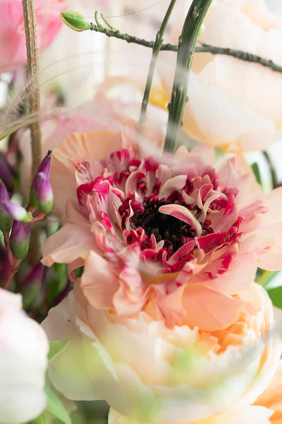 Close up picture of a pink flower on a New Year's Eve Champagne Bar setting 