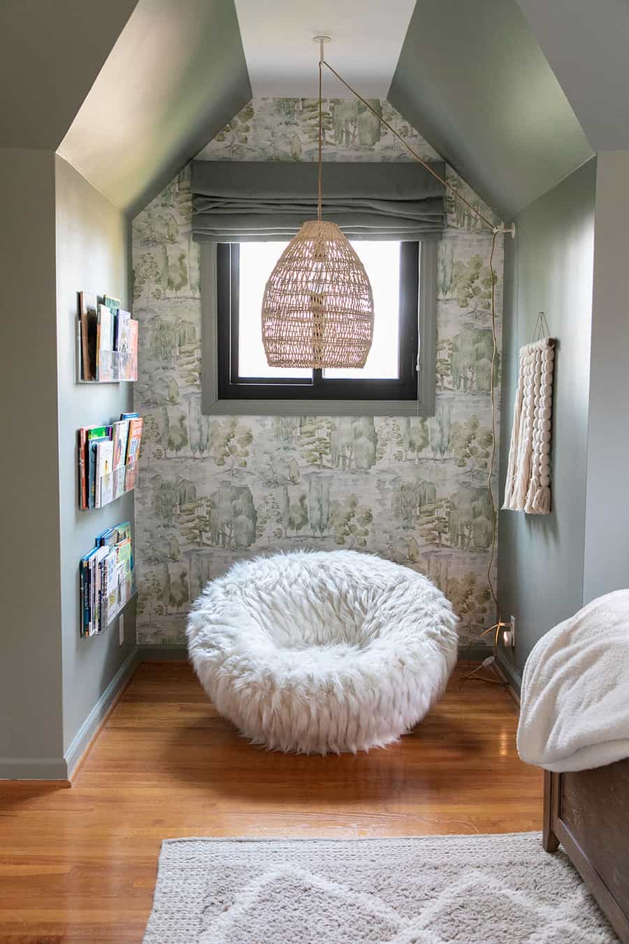 Pottery barn swivel chair with a light in a reading nook