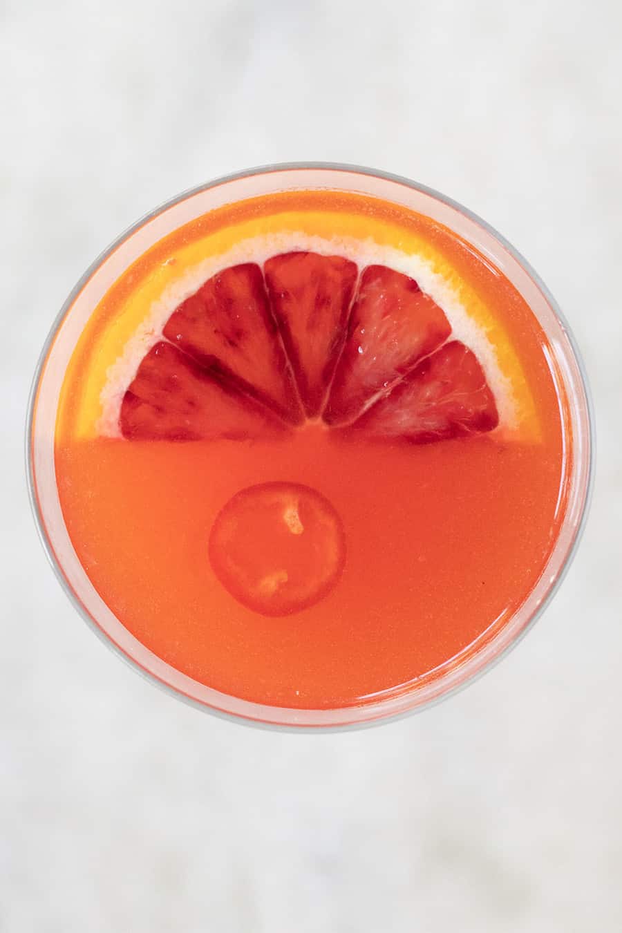 Spicy cocktail recipe with gin, blood orange and red pepper jello