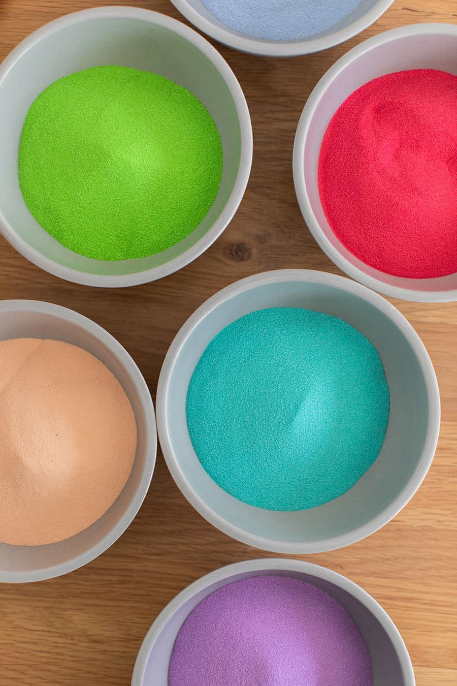 colorful sand in jars at a tropical party