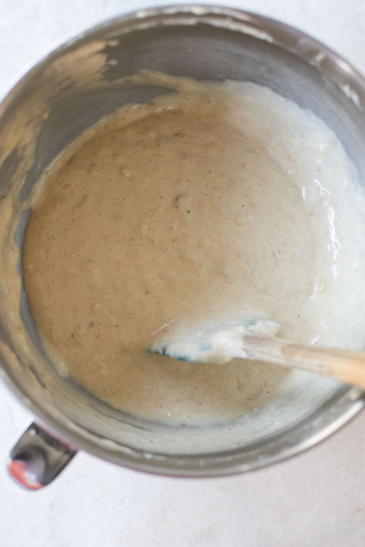 Banana bread batter in a mixing bowl 