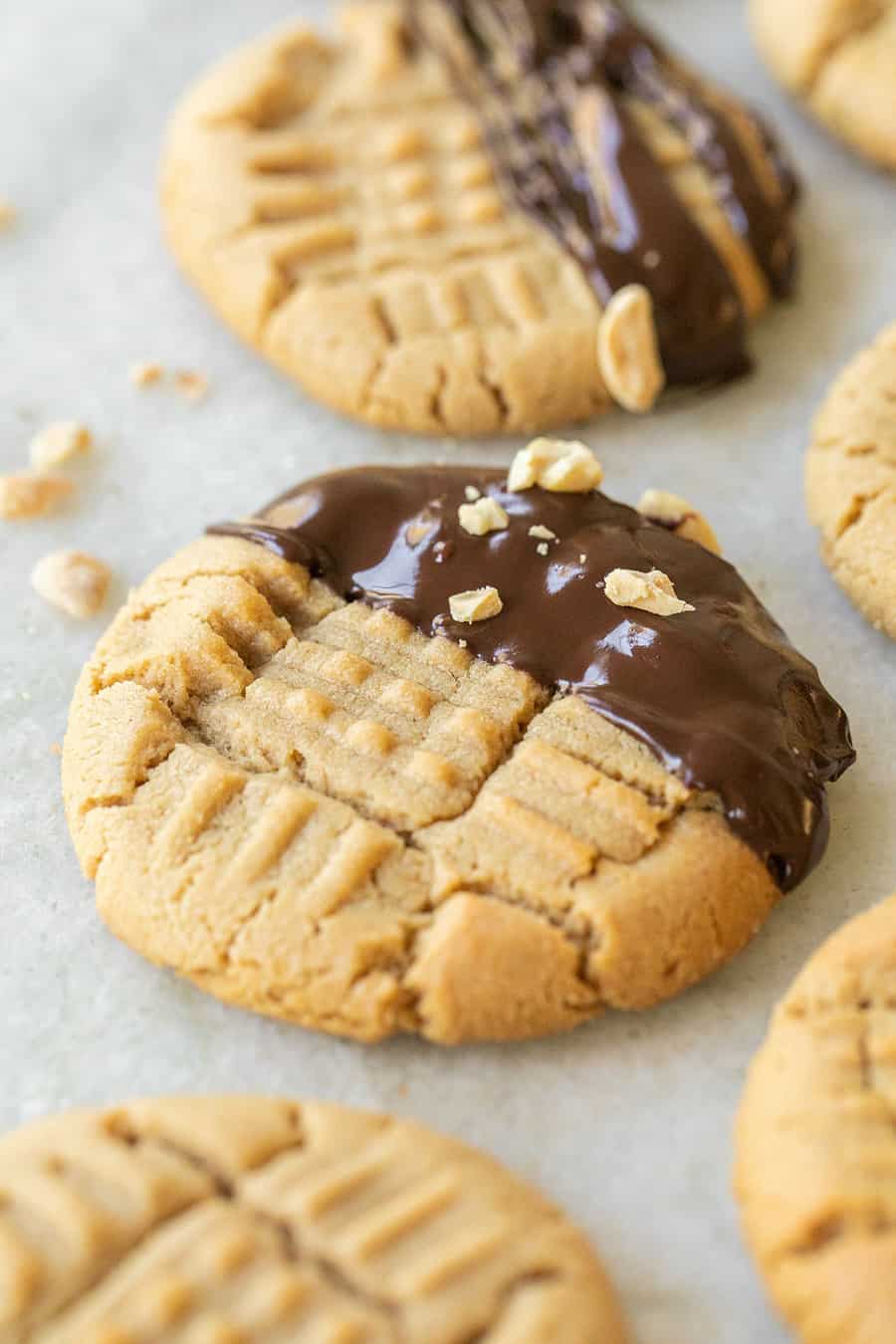 Peanut Butter Cookie Recipe drizzled in chocolate with peanuts 