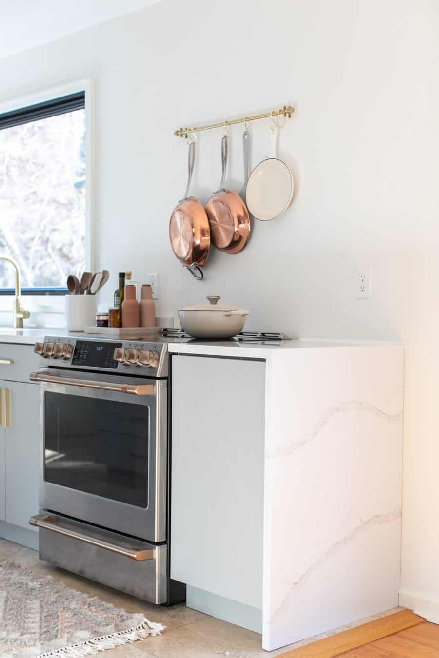 Small kitchen remodel with copper pots, cafe appliances 