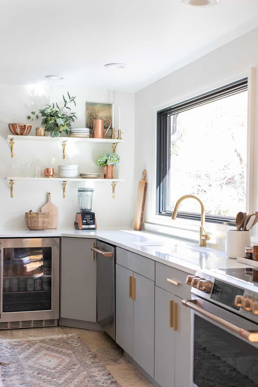 Kitchen remodel using cafe appliances, big window, open shelves 