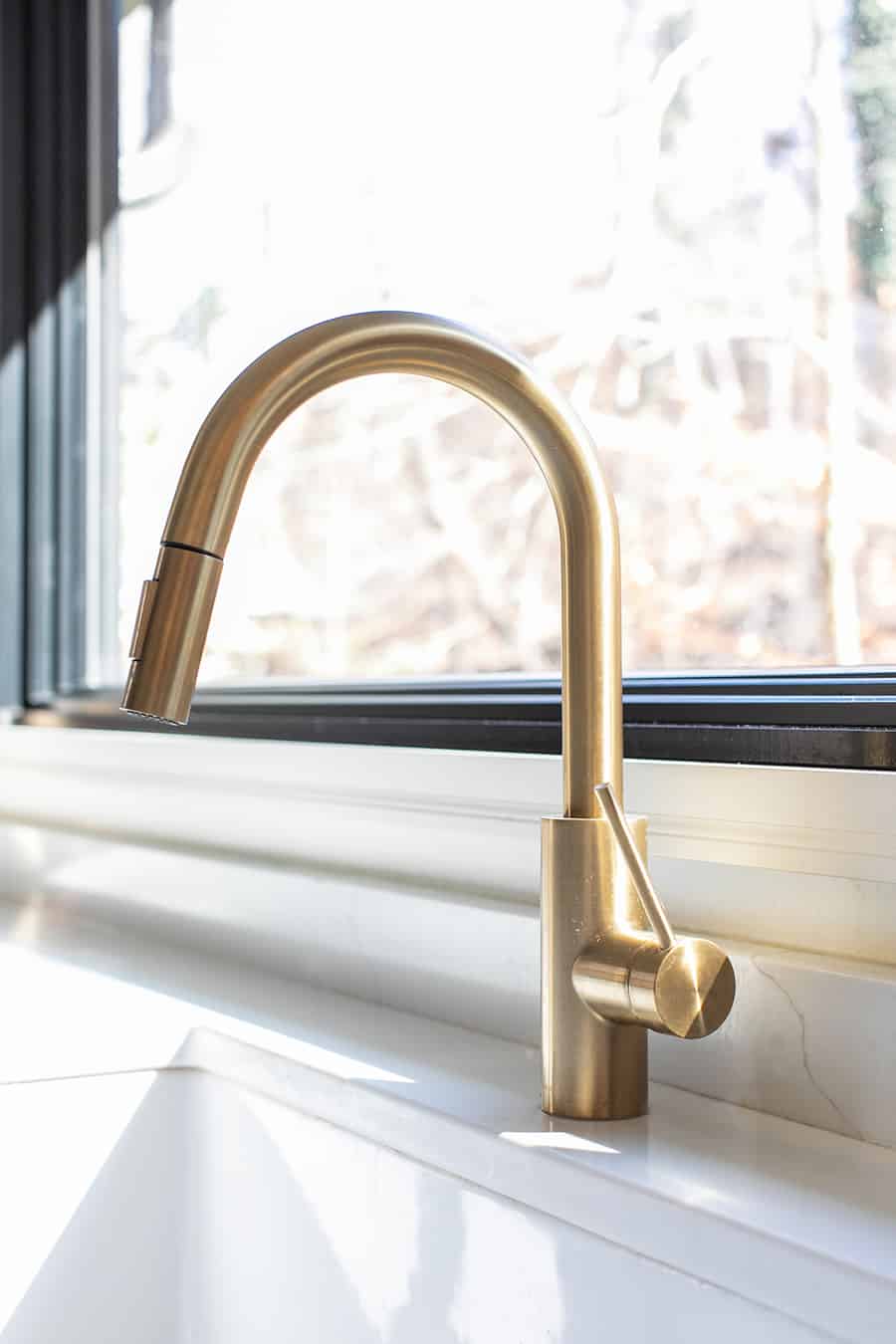 Brass kitchen faucet 