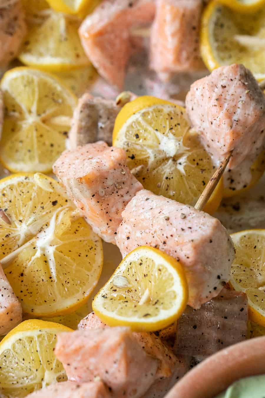 Baked Salmon on skewers with lemon