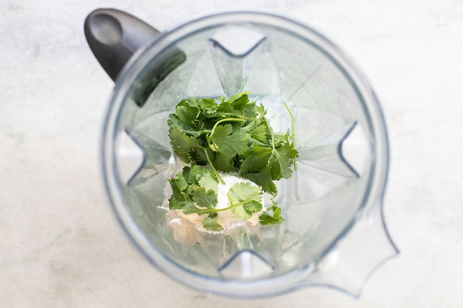 Cilantro and cream cheese in a blender