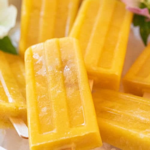 https://sugarandcharm.com/wp-content/uploads/2021/03/Mango-Popsicles-_-8-500x500.jpg