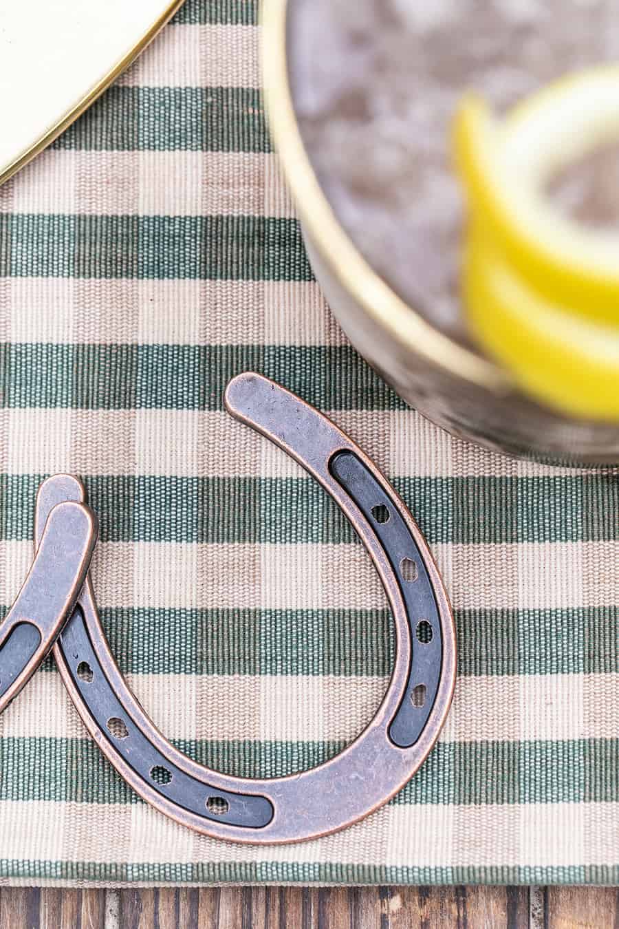 Horse Shoe on checkered tablecloth for the Kentucky Derby 