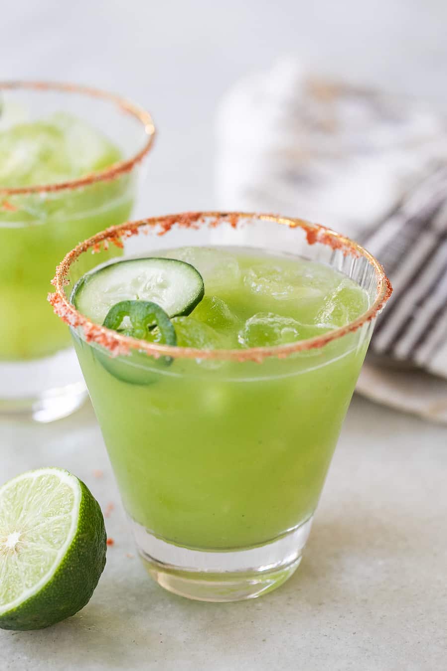 Spicy green cocktail with cucumber and jalapeño