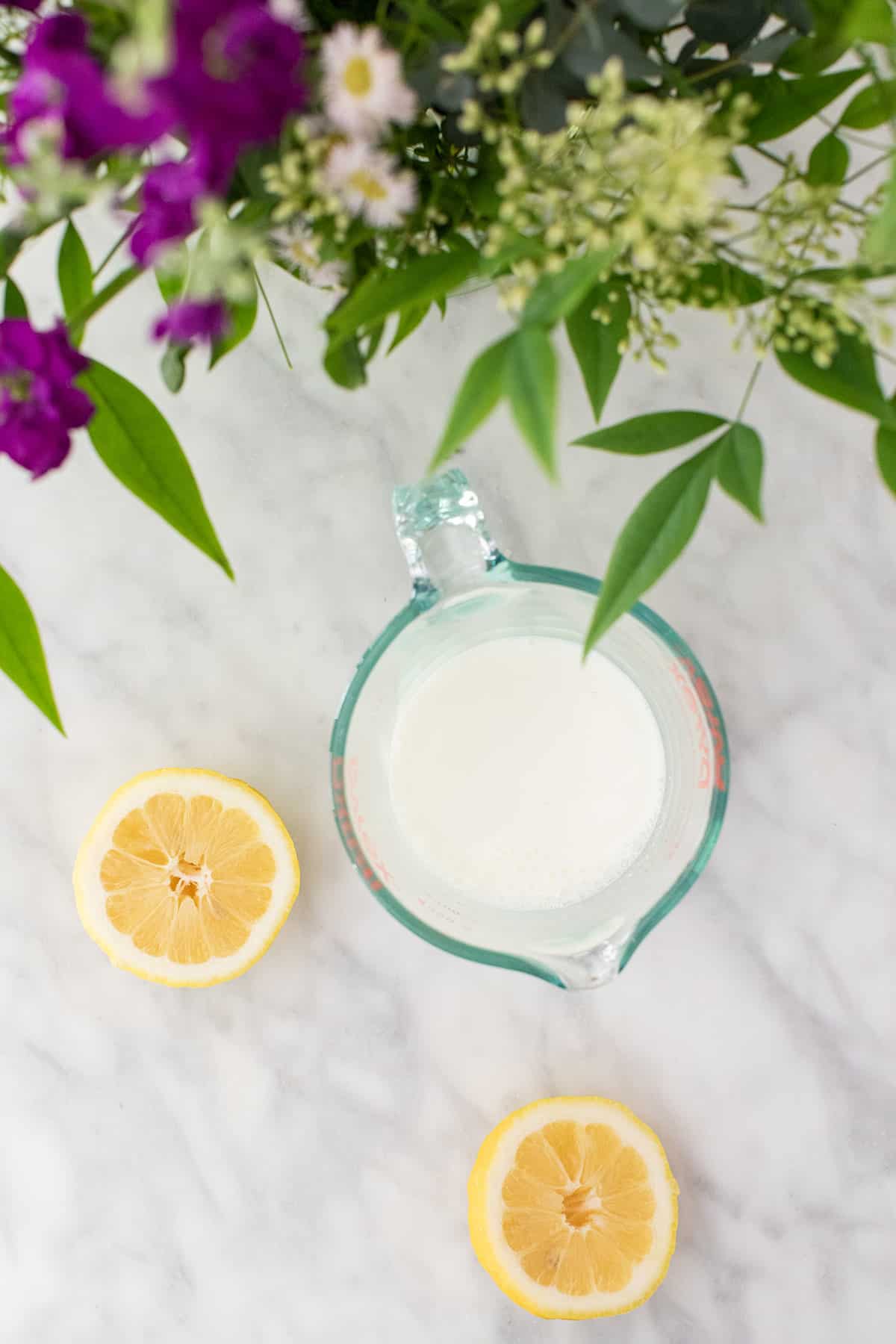 Milk and lemons on a table