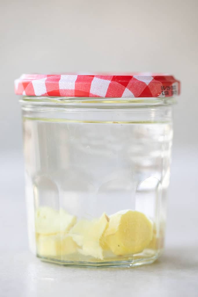 Infusing vodka with ginger. 