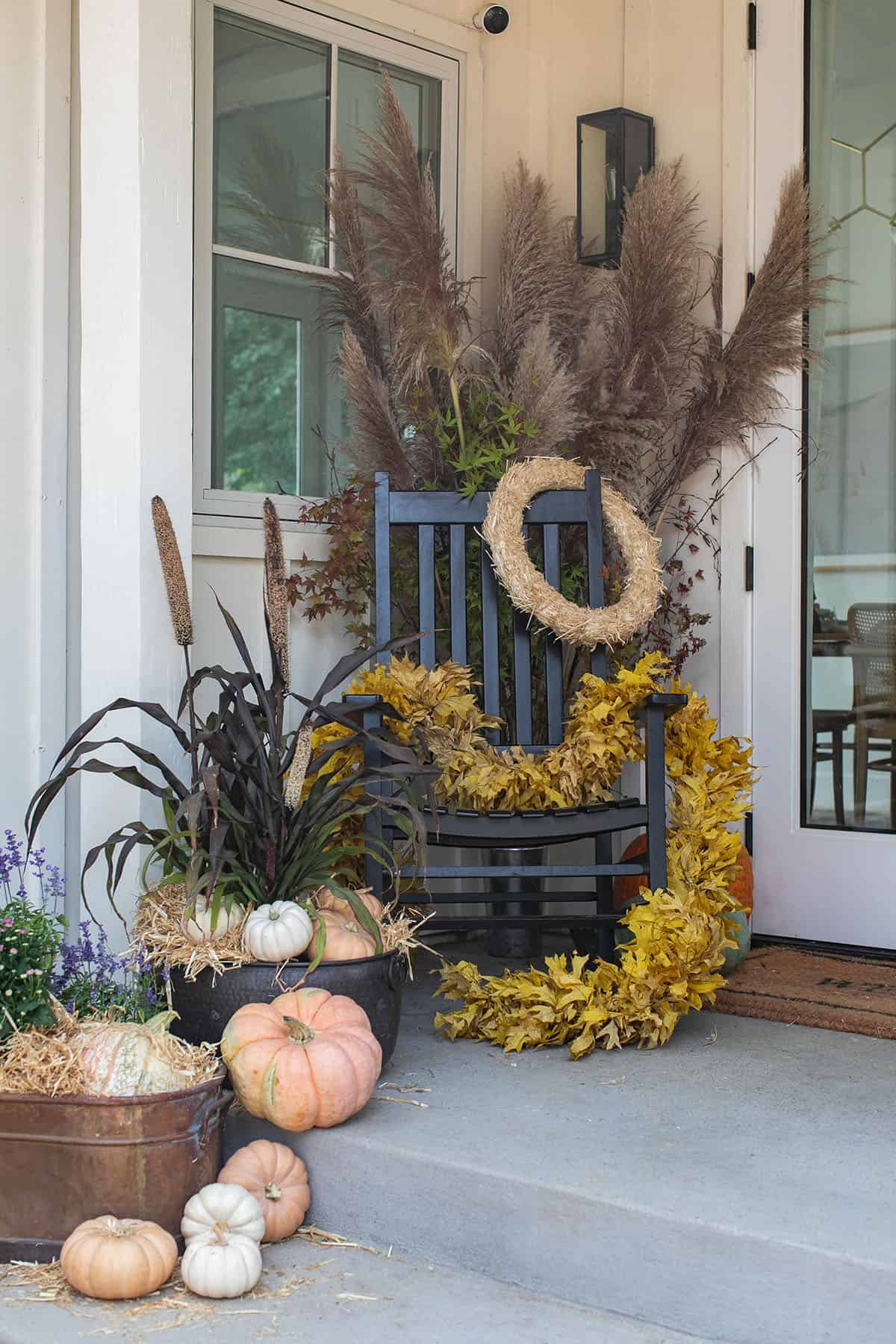 fall porch rocking chair and flowers