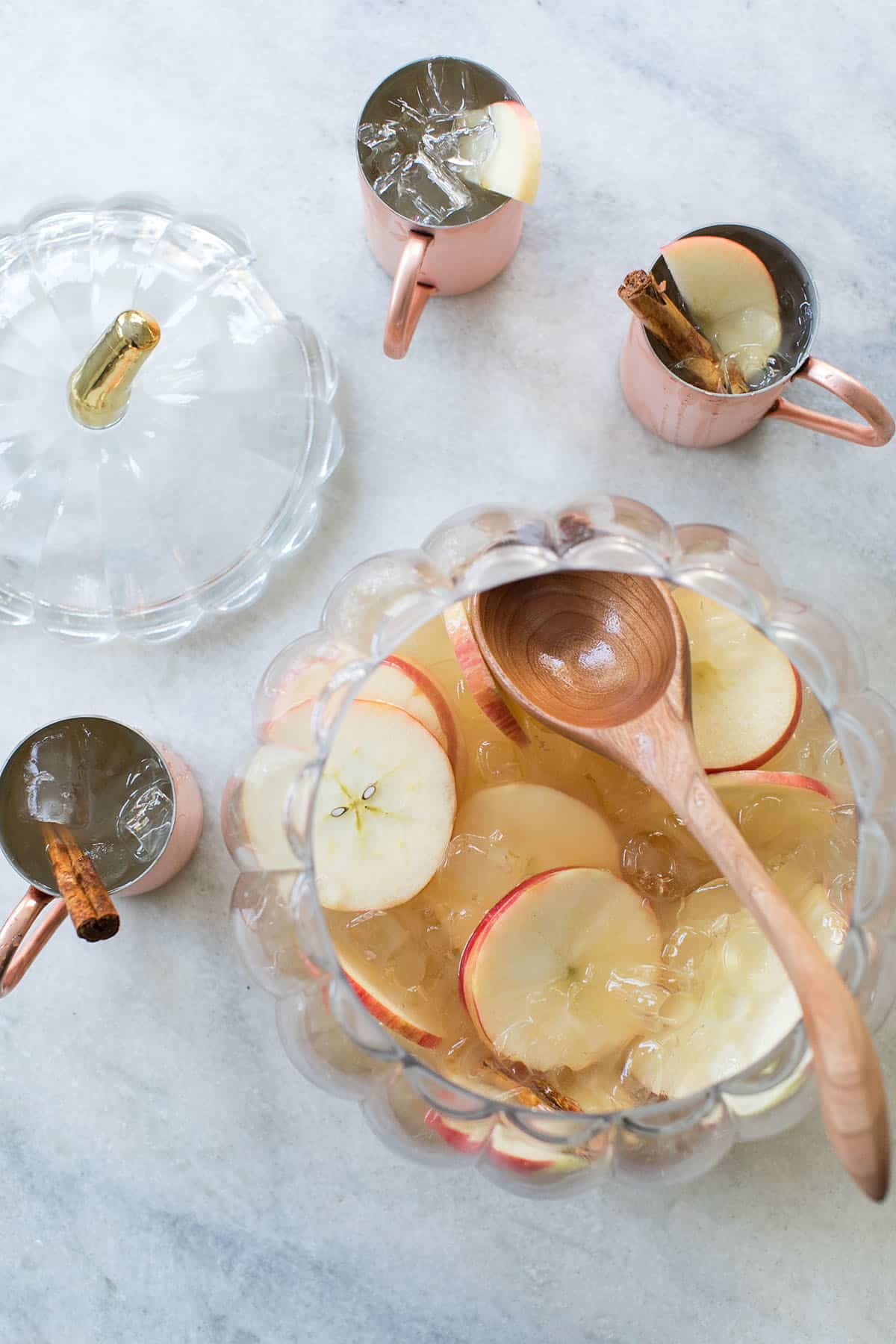 fall cocktail punch - apple slices, maple syrup