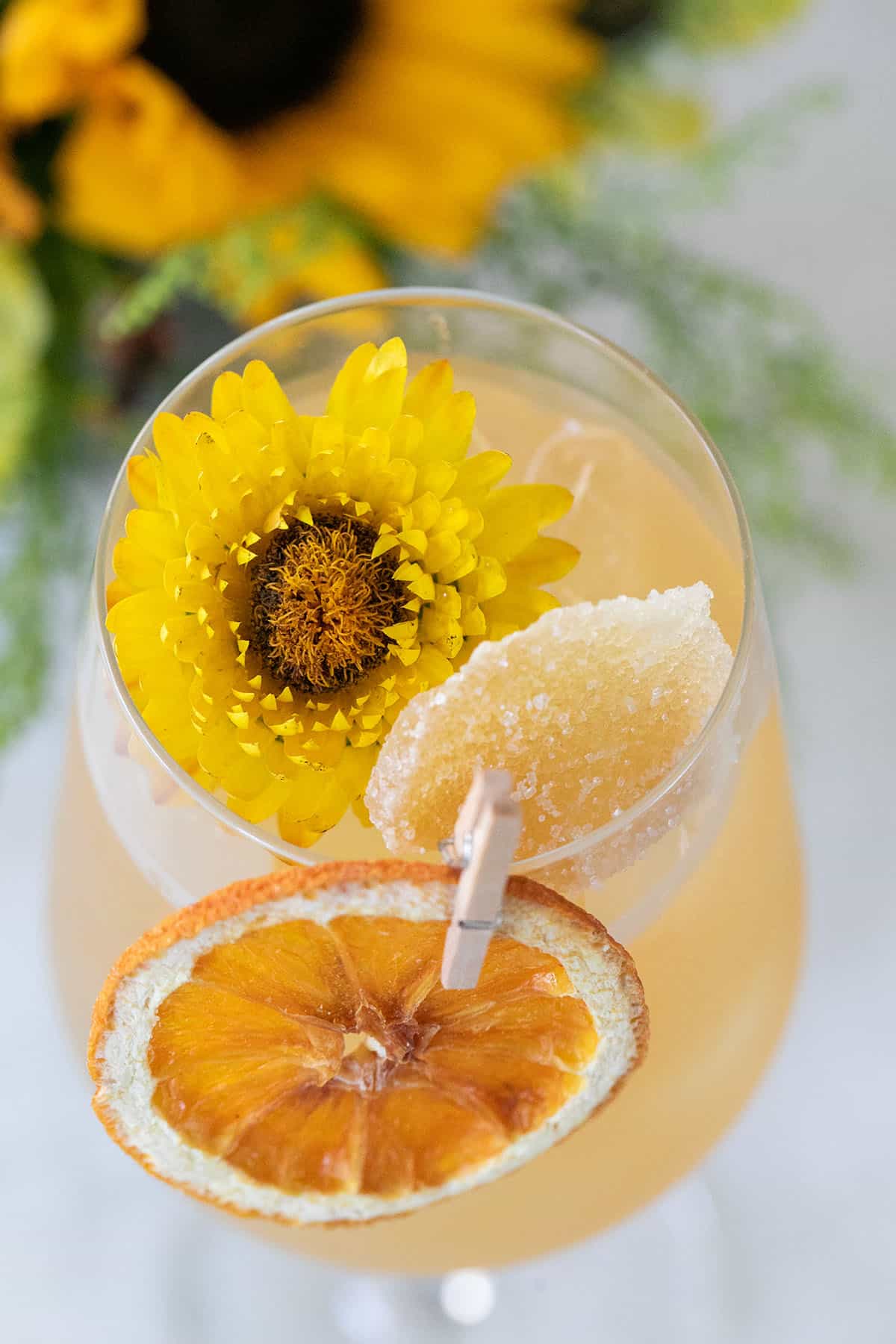 whiskey punch recipe in a glass with candied ginger