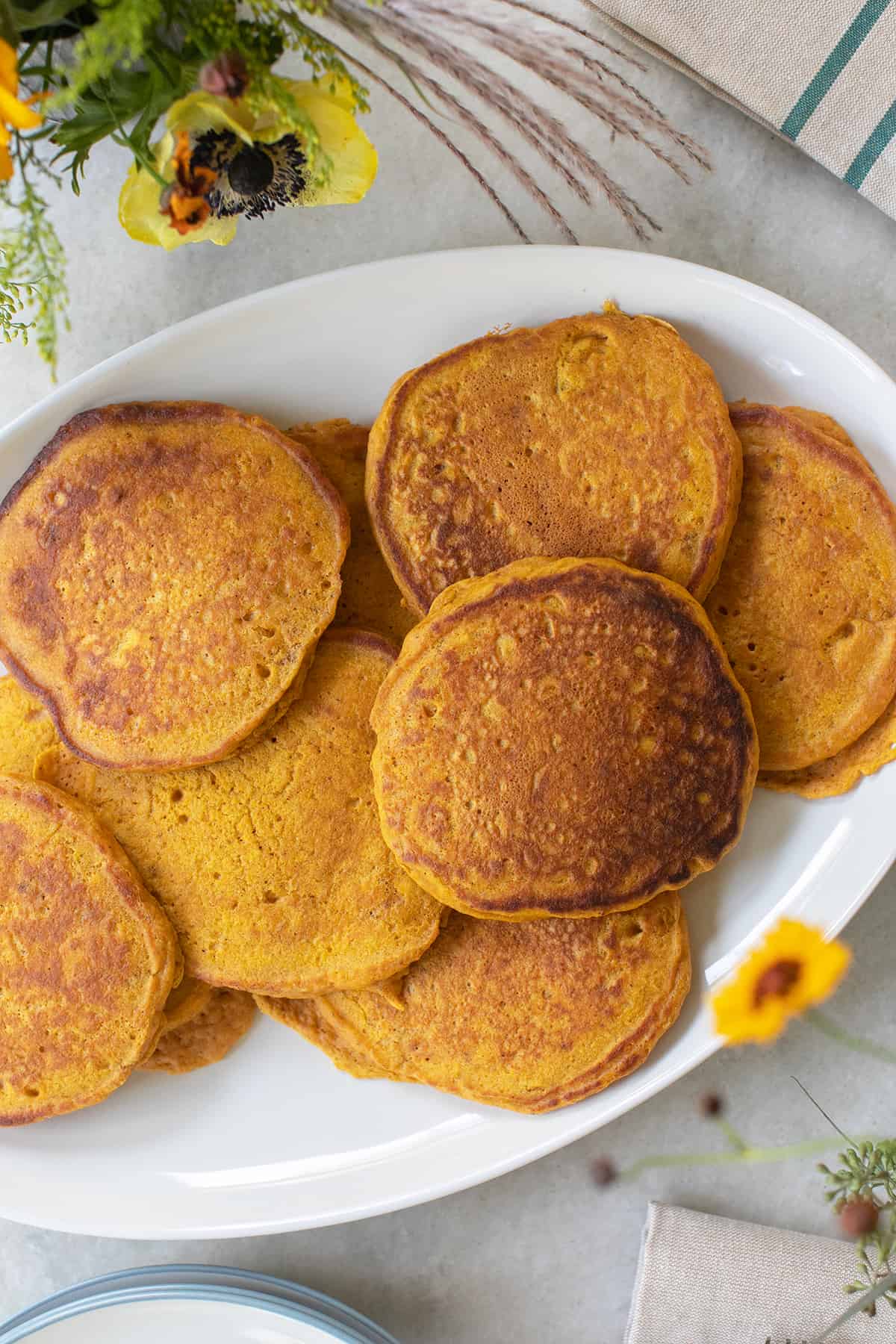 pumpkin spice pancakes on a plate.