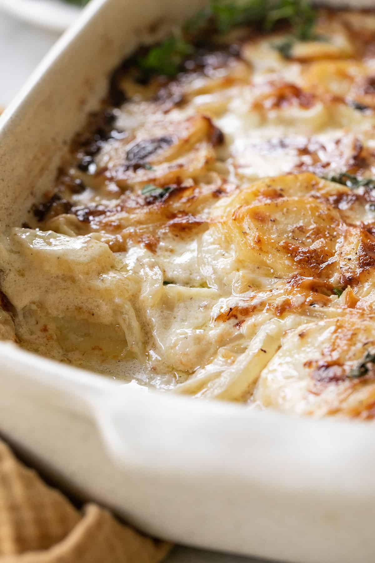 Al gratin Potatoes in a baking dish.