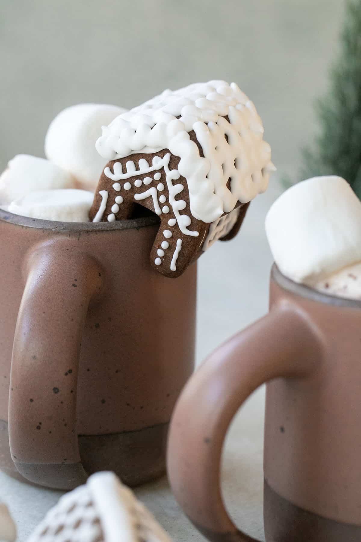 mini gingerbread house on a mug