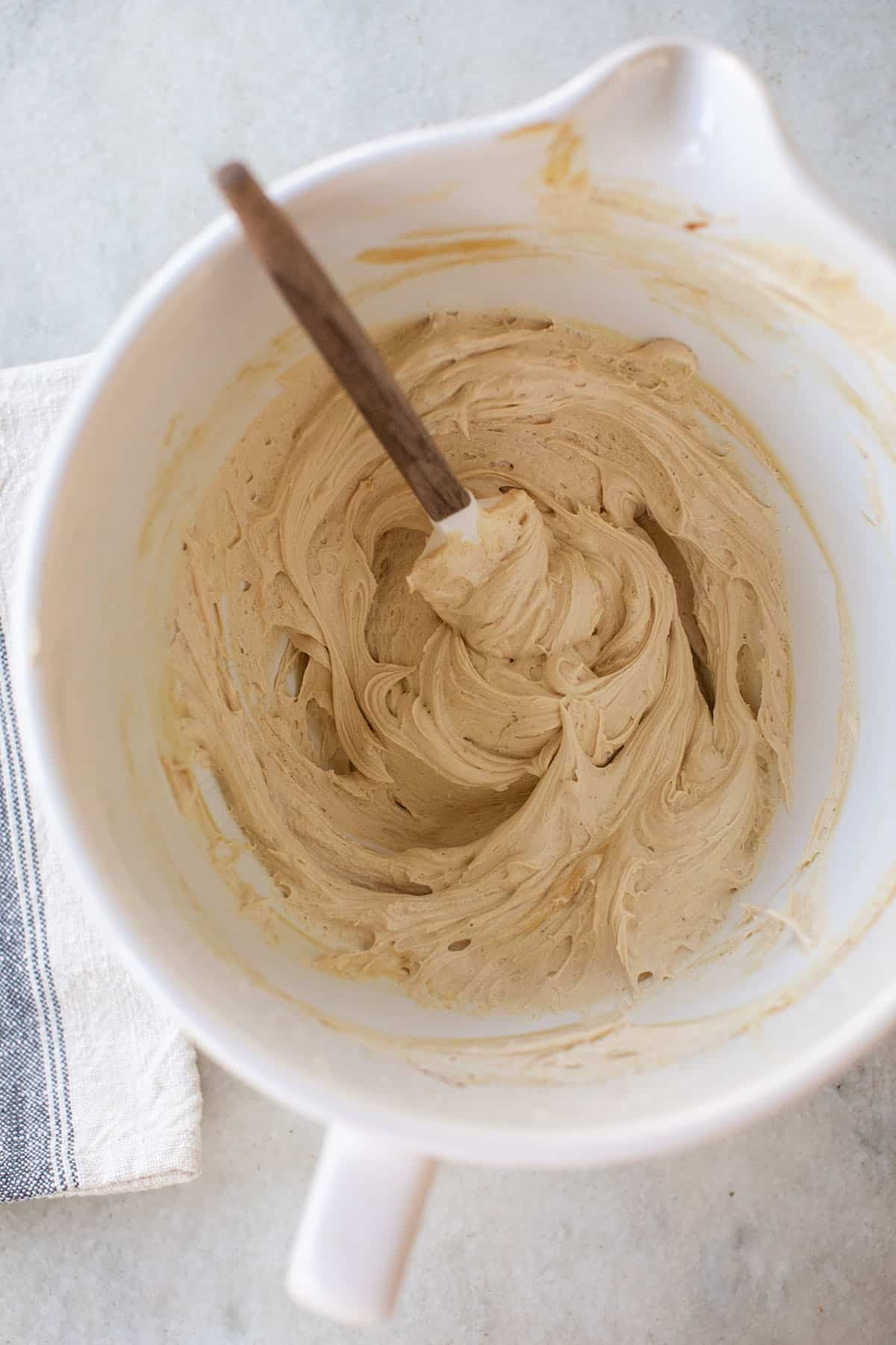 whipped buttercream in a white bowl 