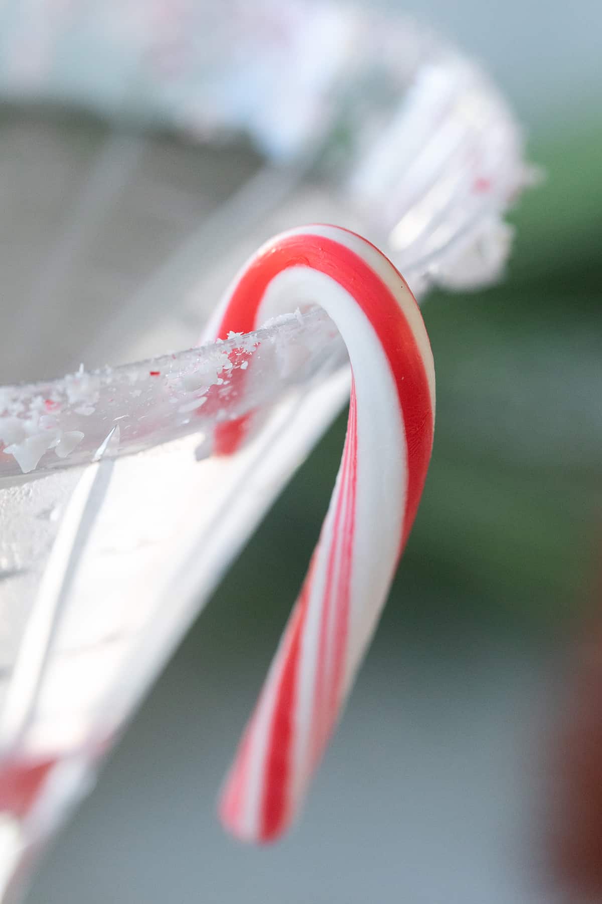 Candy cane on a martini glass - chocolate peppermint martini