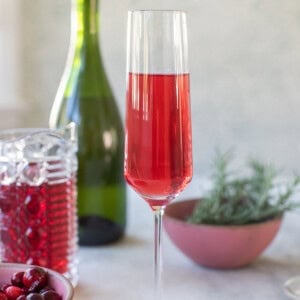 poinsettia cocktail in a Champagne flute