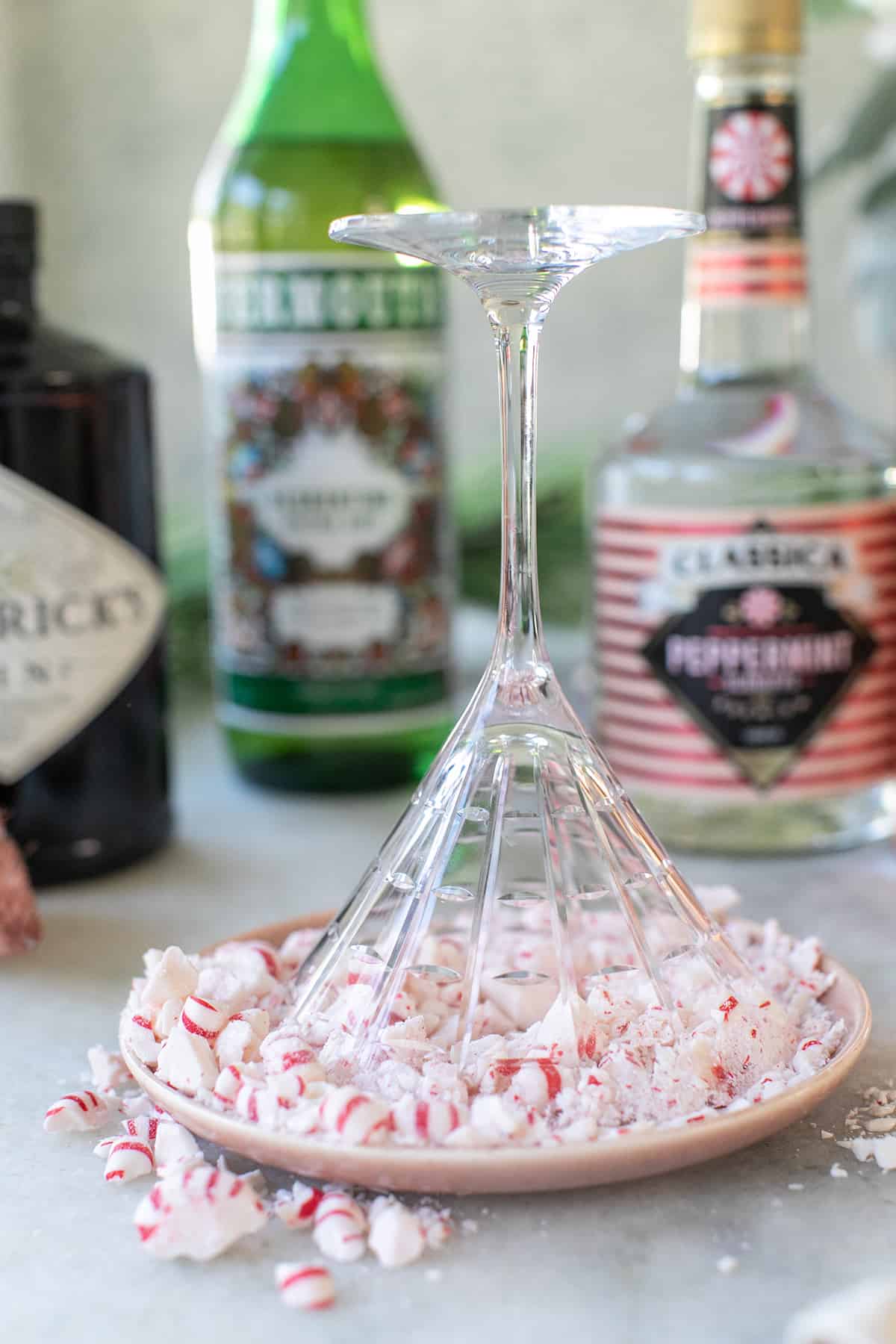 riming a martini glass glass with crushed candy canes