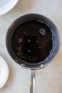 water and brown sugar in a saucepan