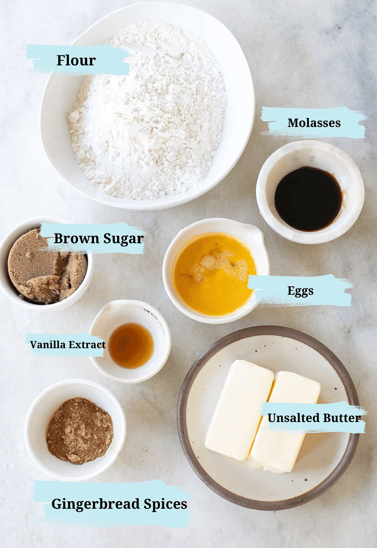 Ingredients in bowls to make spritz cookies.