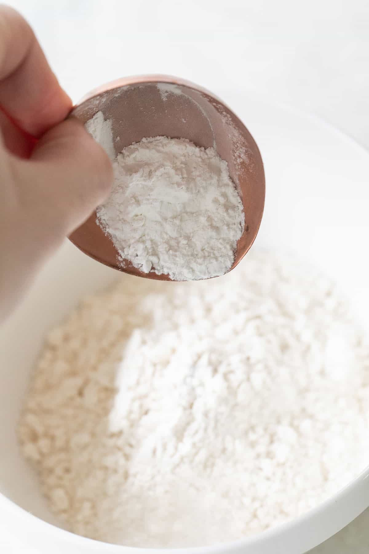 adding baking powder to all-purpose flour