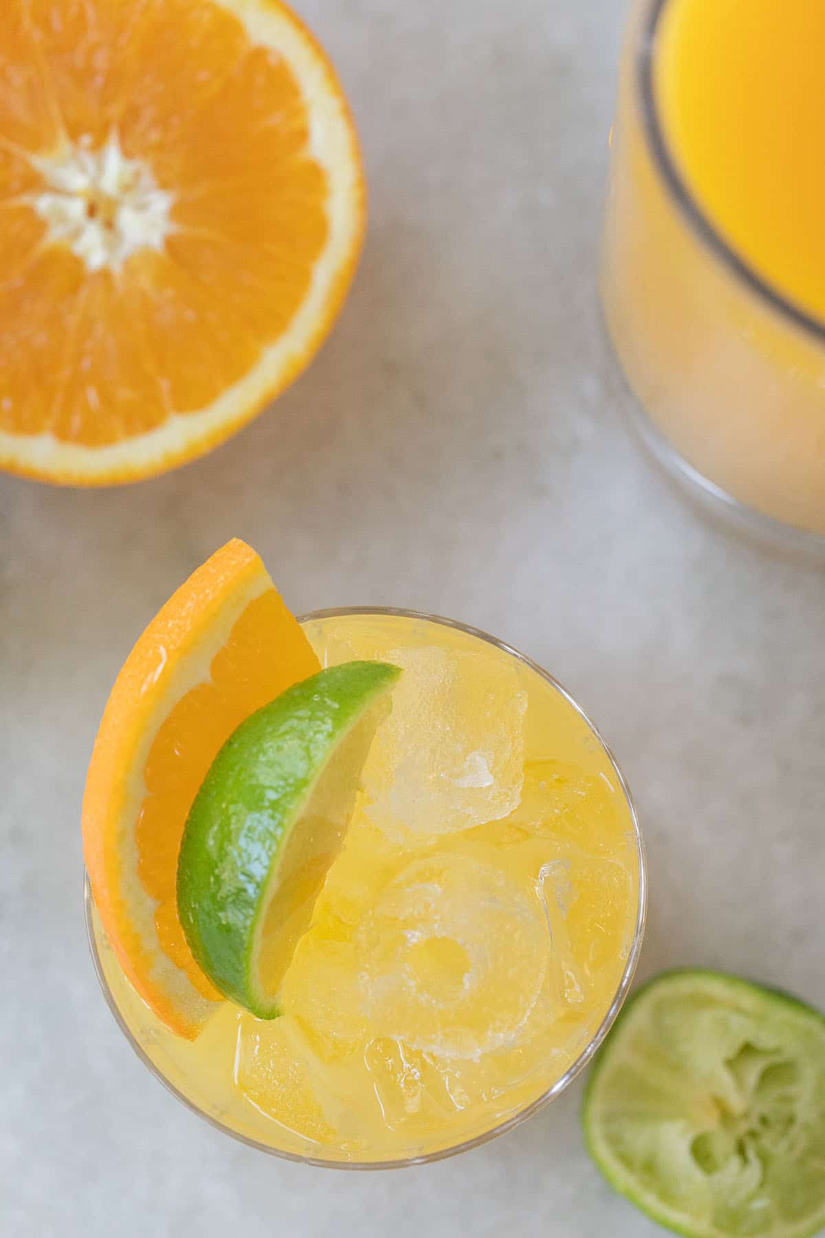 best tequil and orange juice cocktail with lime and orange wedge