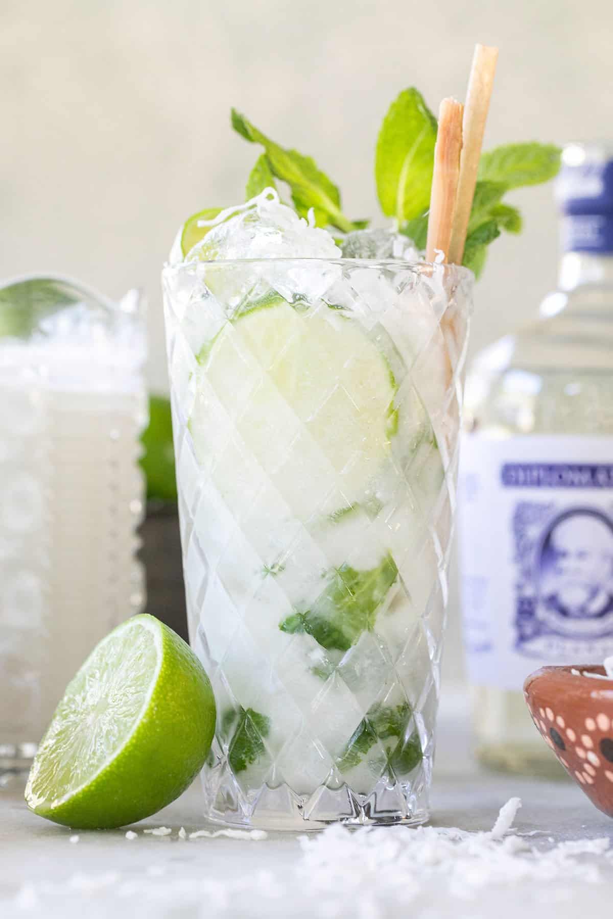 Refreshing coconut mojito with fresh lime and mint. 