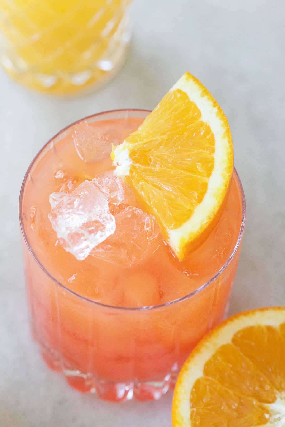 A tequila sunrise in a small glass.