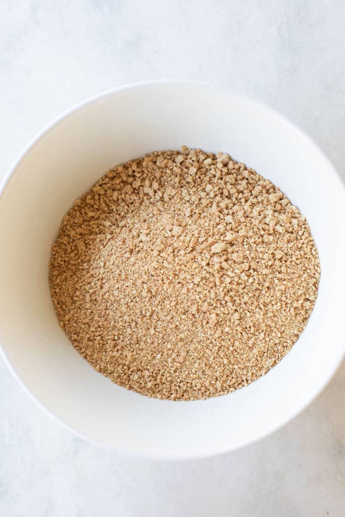 Graham cracker crumbs in a bowl.