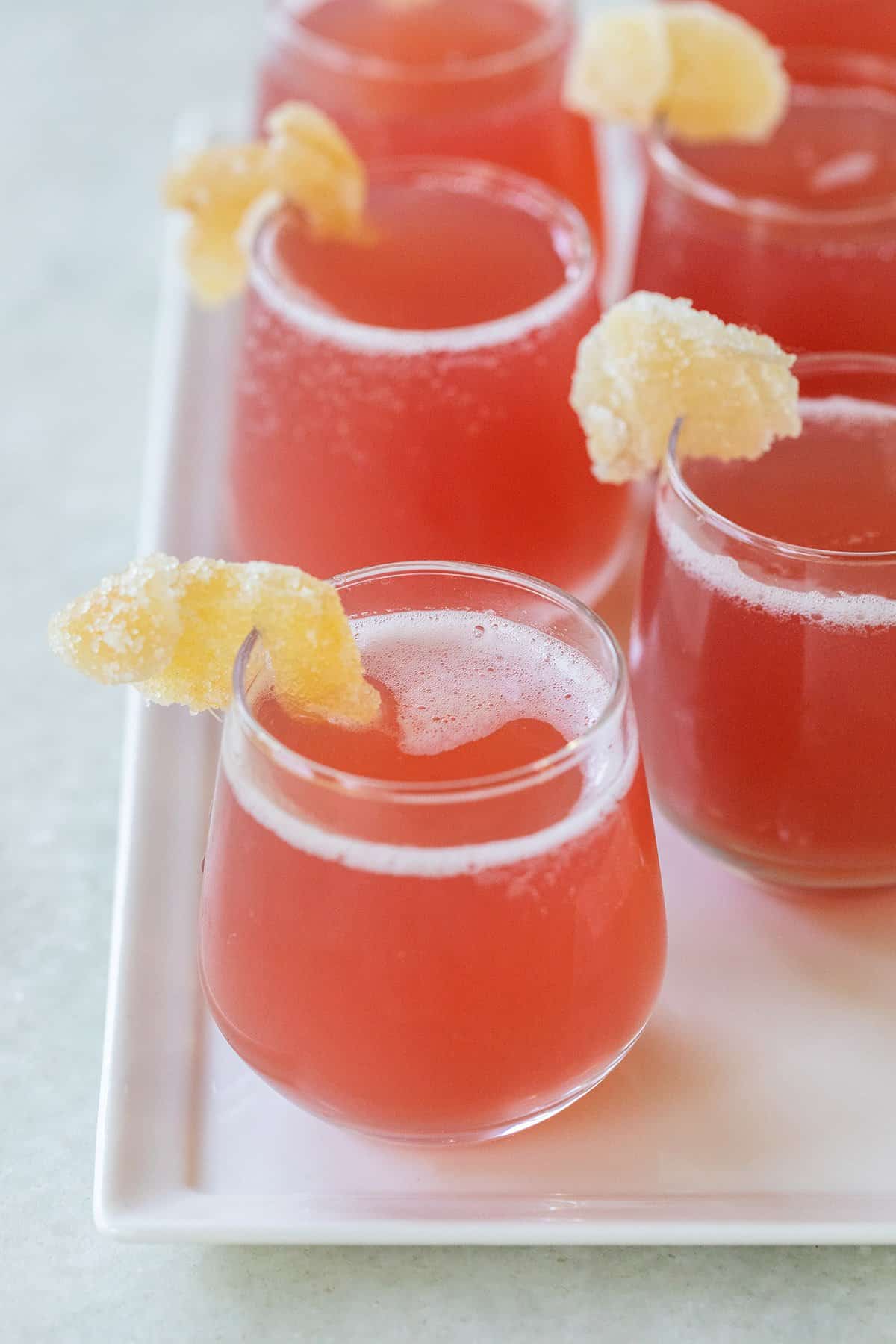 Jolly Rancher shots with candied ginger.