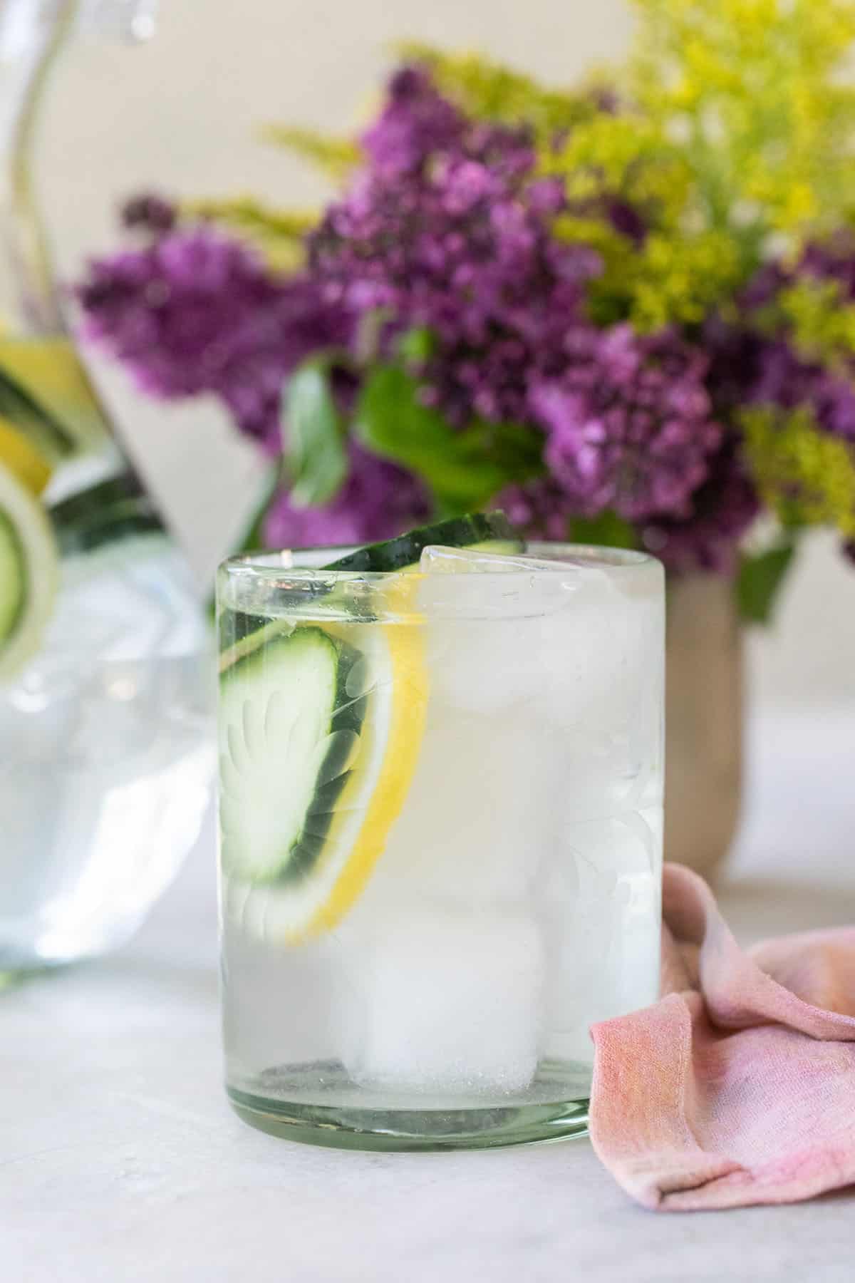 A glass of cucumber lemon water.