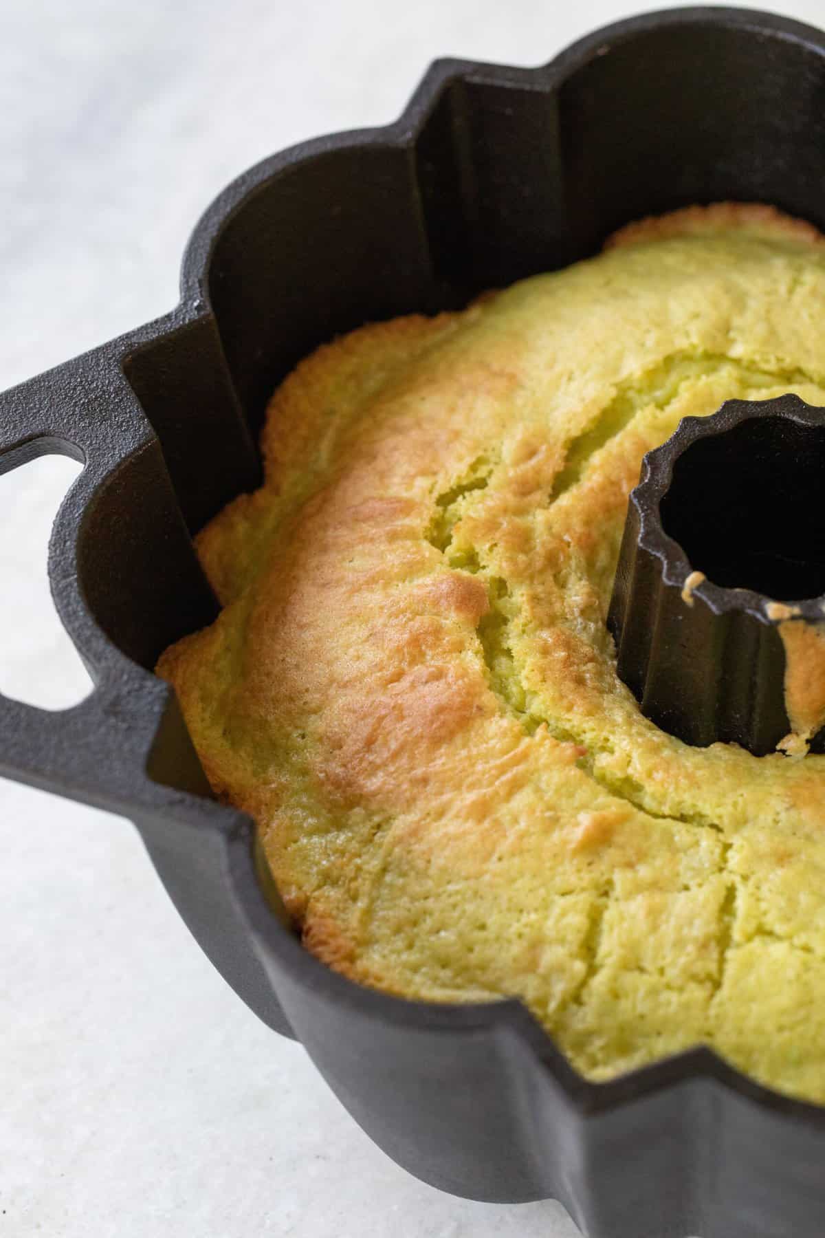 pistachio cake in a bundt pan
