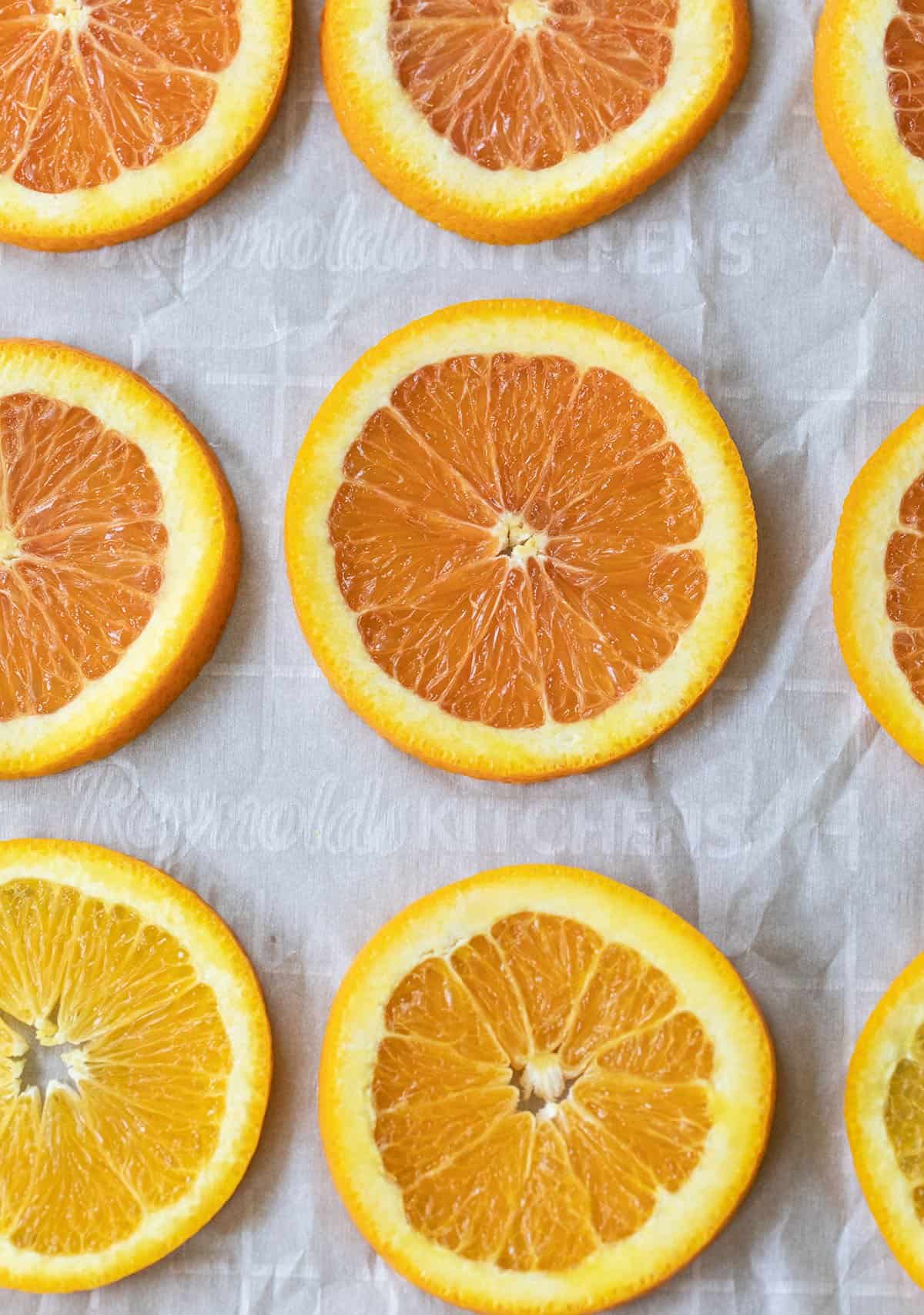 orange slices on parchment paper 