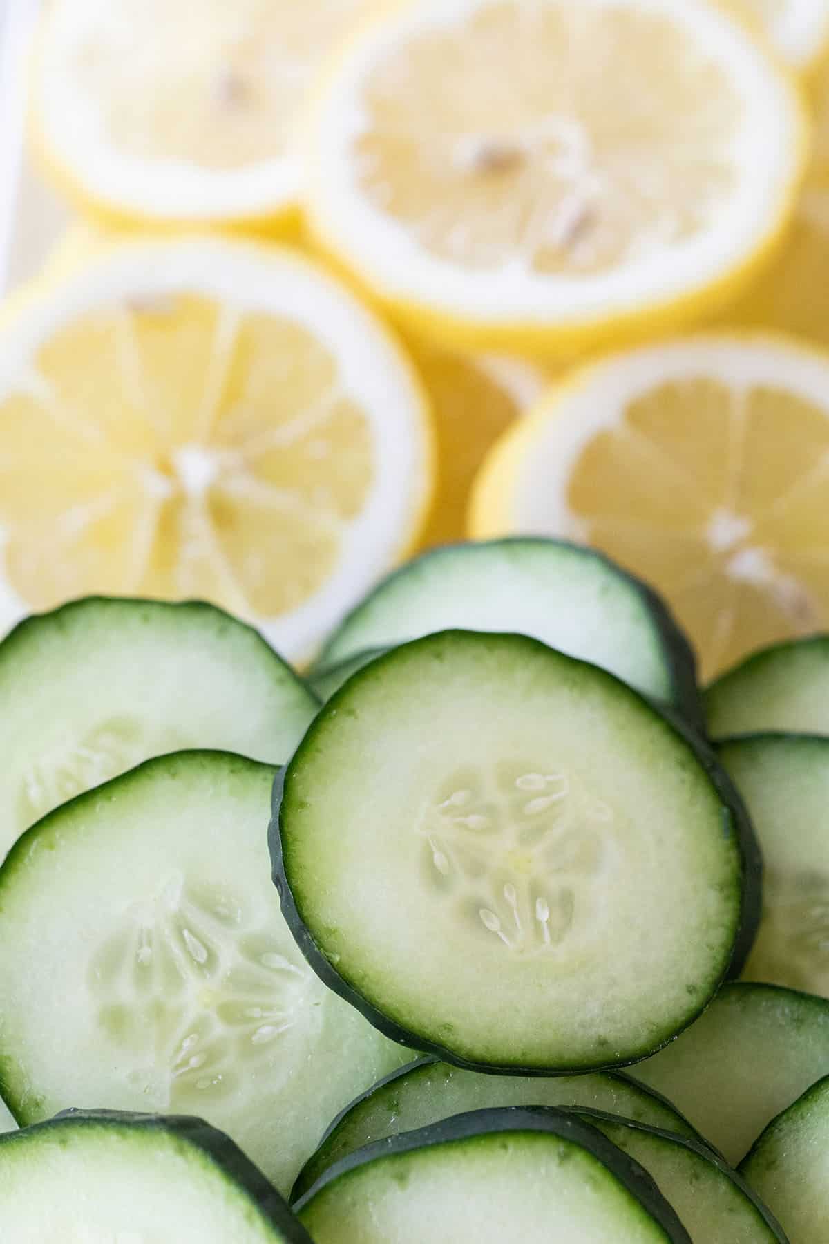 sliced cucumbers and lemons