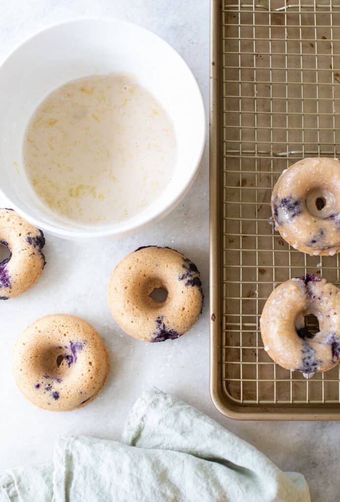 Baked blueberry donuts with glaze.