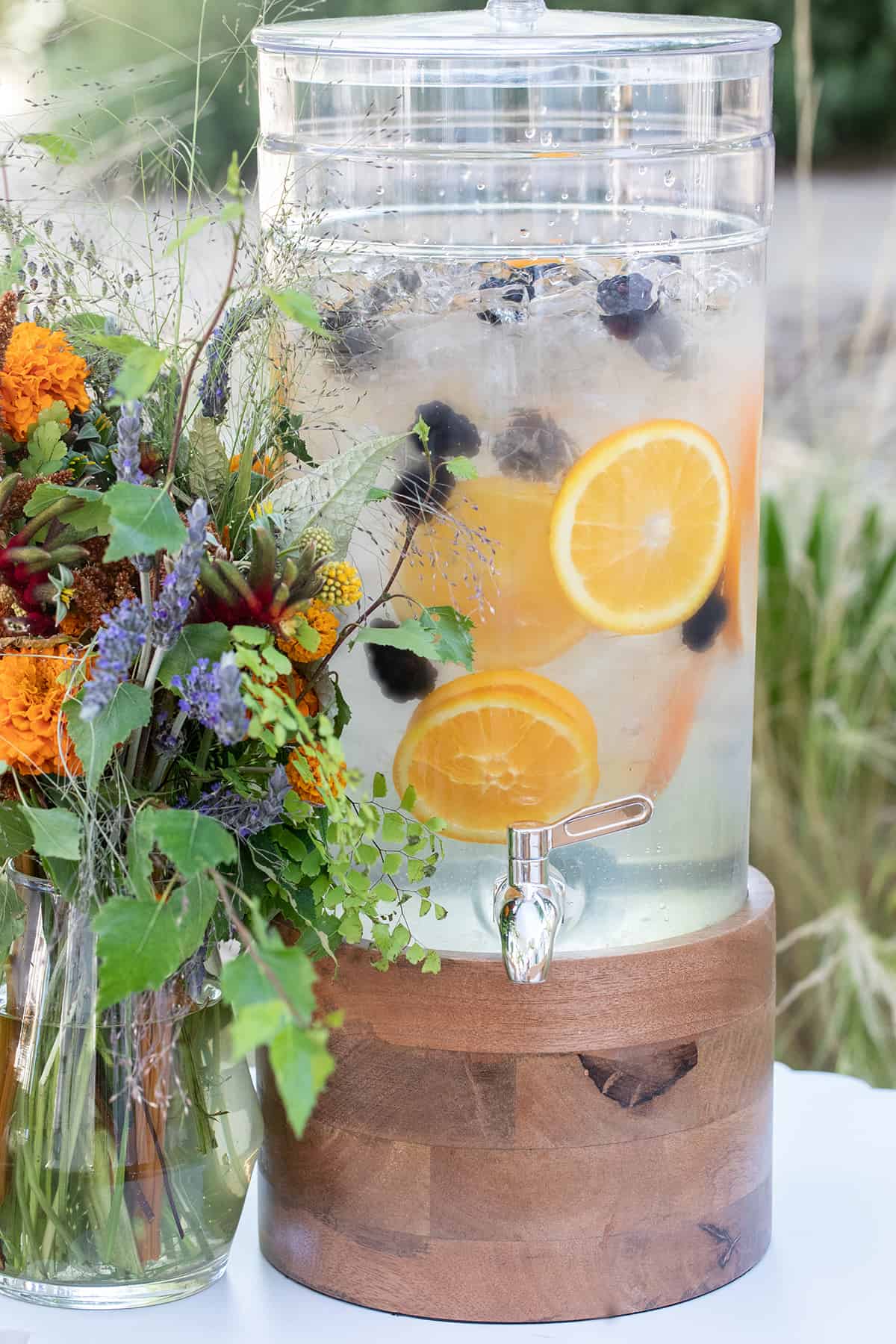 water with berries and orange slice in a decanter