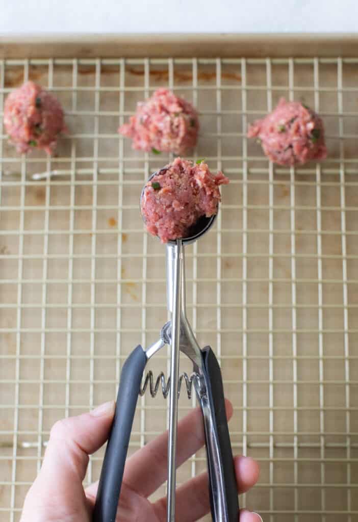 Small cookie scooper to make mini meatballs.
