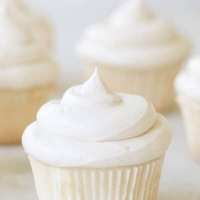 Vanilla cupcakes with buttercream frosting.