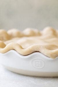 buttery pie crust in a pie dish