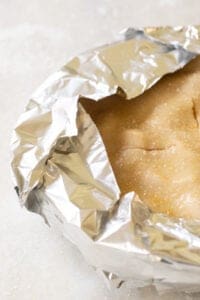 covering the pie crust with tinfoil