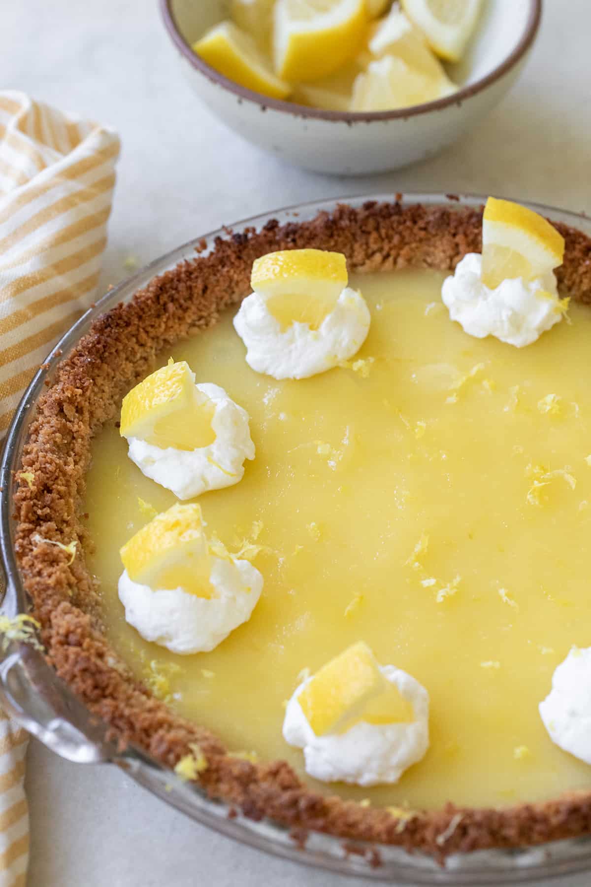 yellow fruit pie with whipped cream 