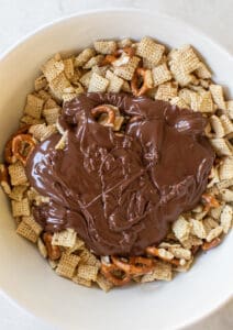 melted chocolate and peanut butter over cereal