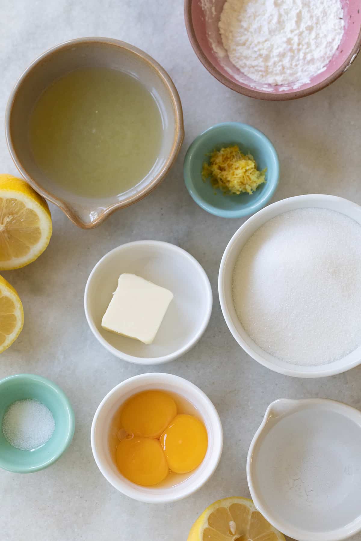 egg yolks, lemon juice, lemon zest, sugar, butter and salt in small bowls